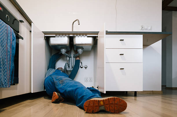 Professional Drain Cleaning technician working in Malibu, CA